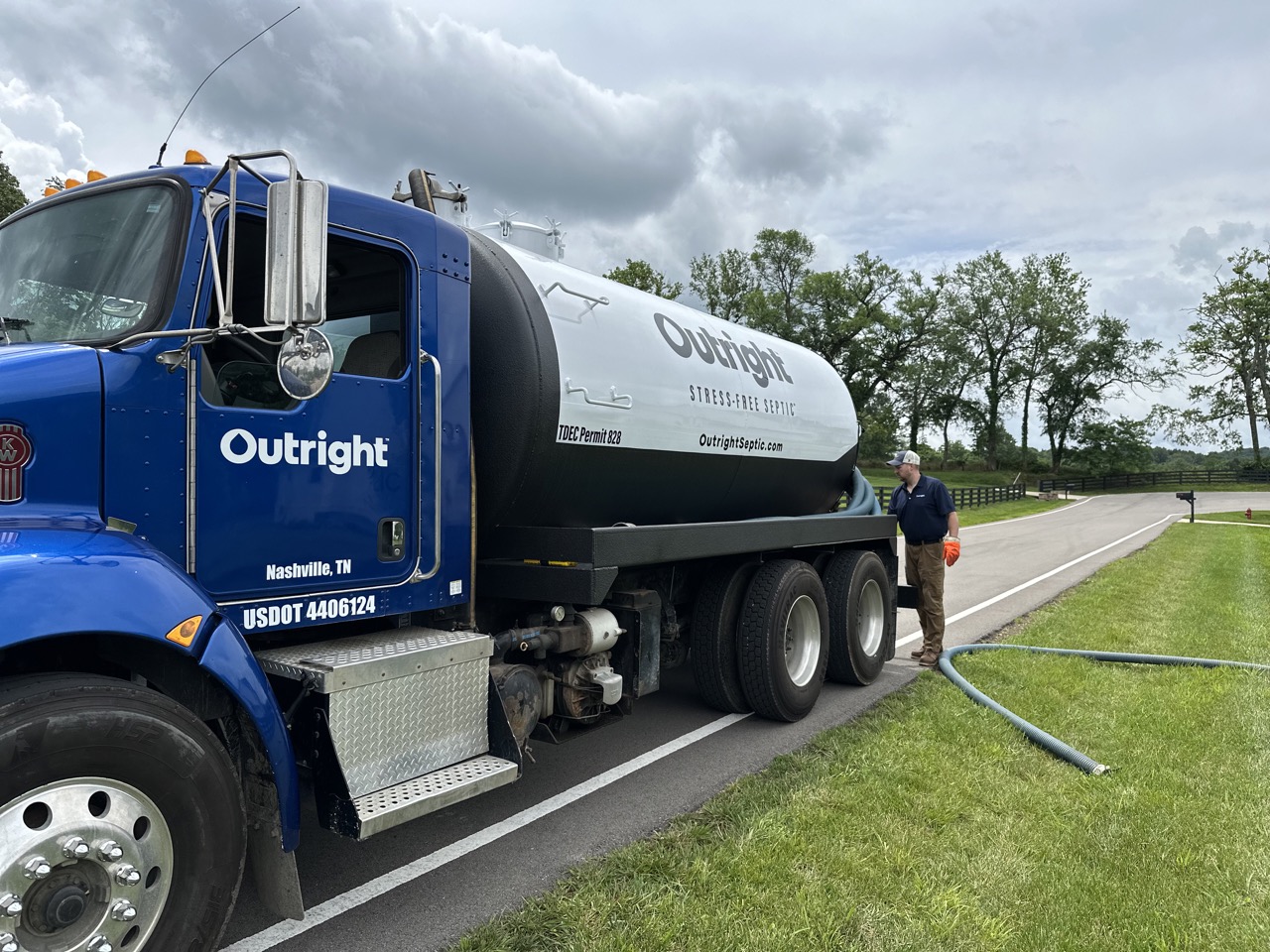 Outright Septic technician with pump truck